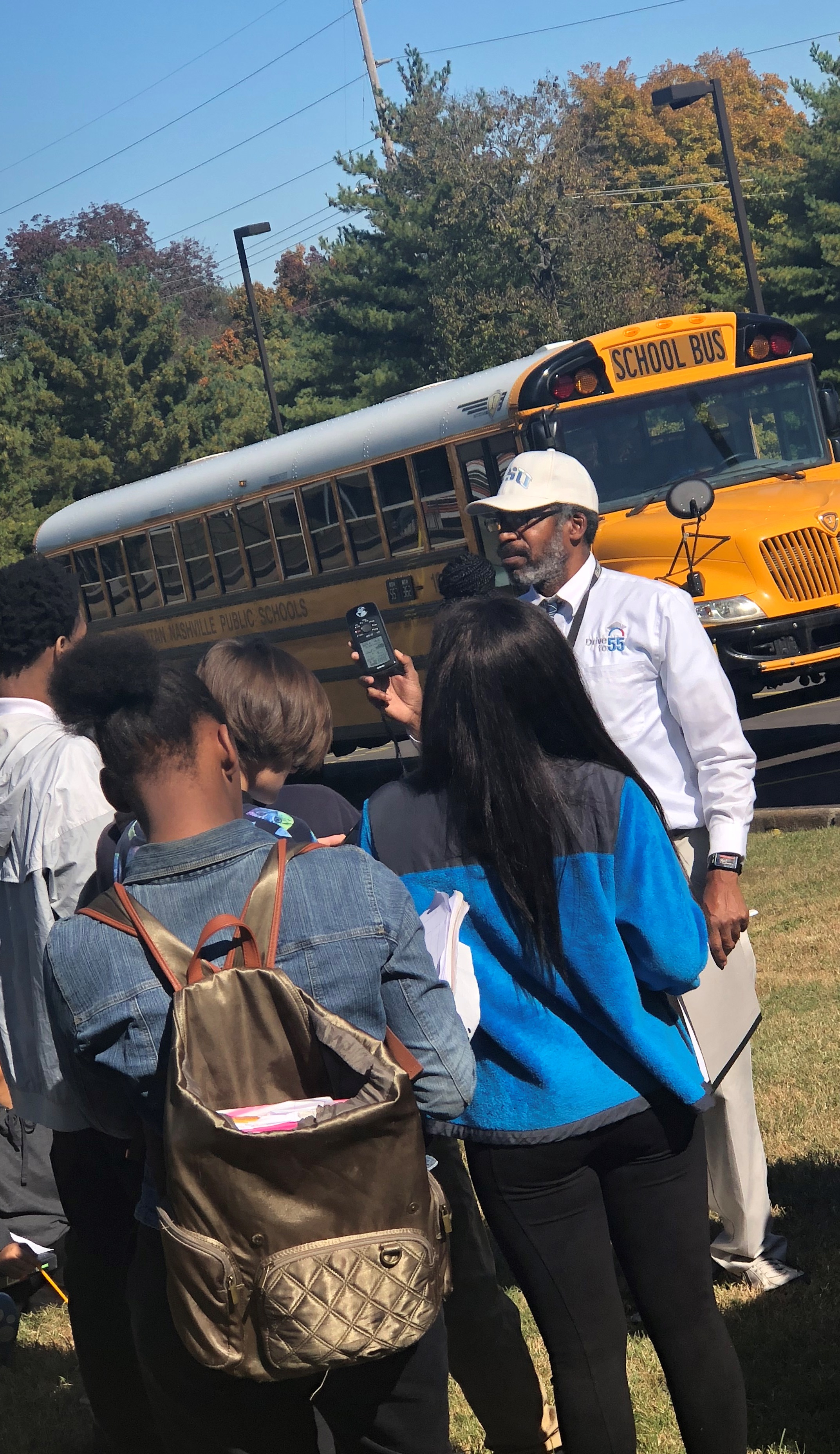 Dr Padgett works with students to collect data in the field.