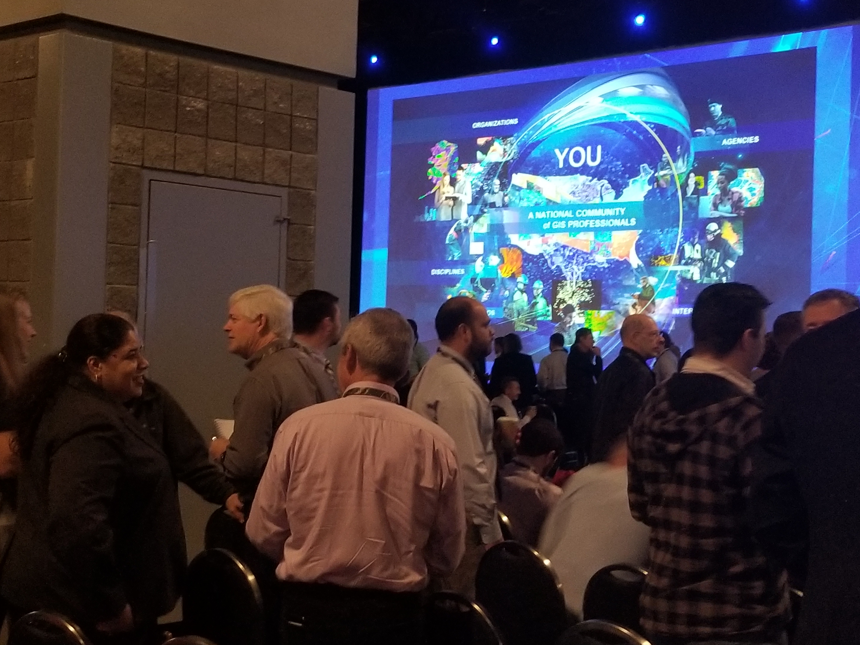 Attendees networking in the conference
